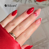 Red and subtle decorations - a classy Valentine’s manicure